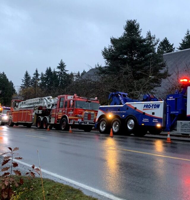 Team Pro-Tow Tows a Seattle Fire Truck