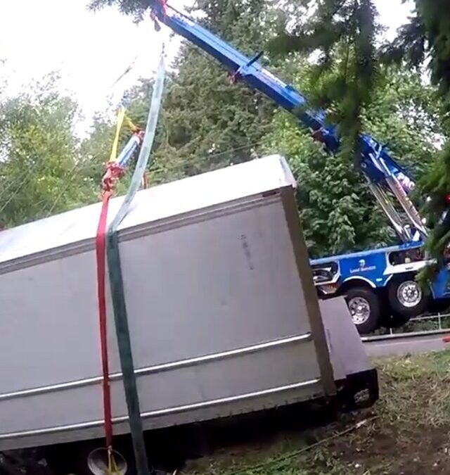 Pro-Tow Fishes a Box Truck Out of a Creek