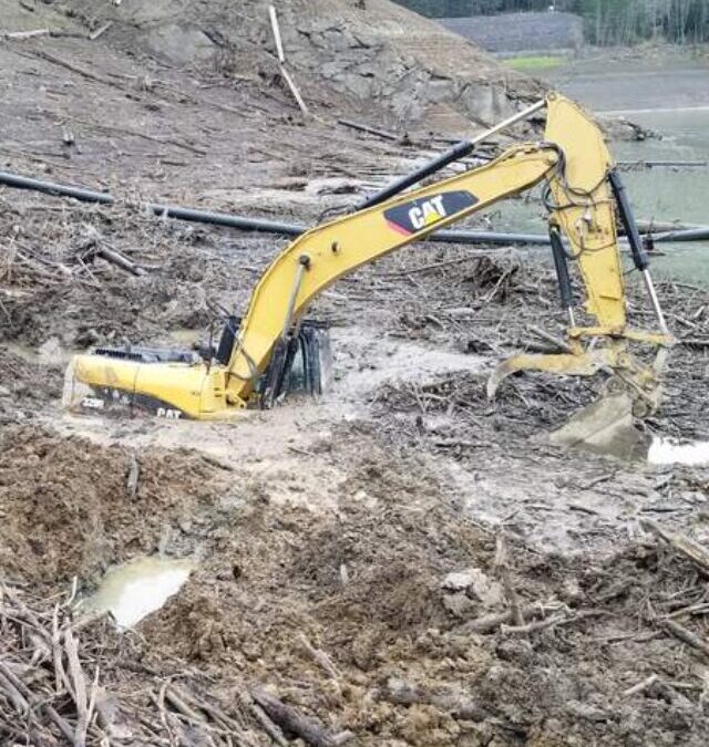 Digging Out a Buried Excavator