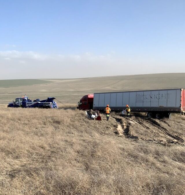 Tractor and Trailer Hauled Off the Median