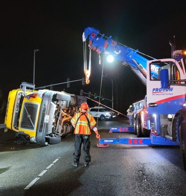 Flipped Semi and Trailer Get a Lift