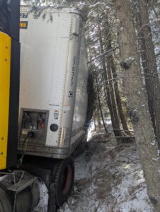 Stuck semi-truck needs a semi-truck winch out